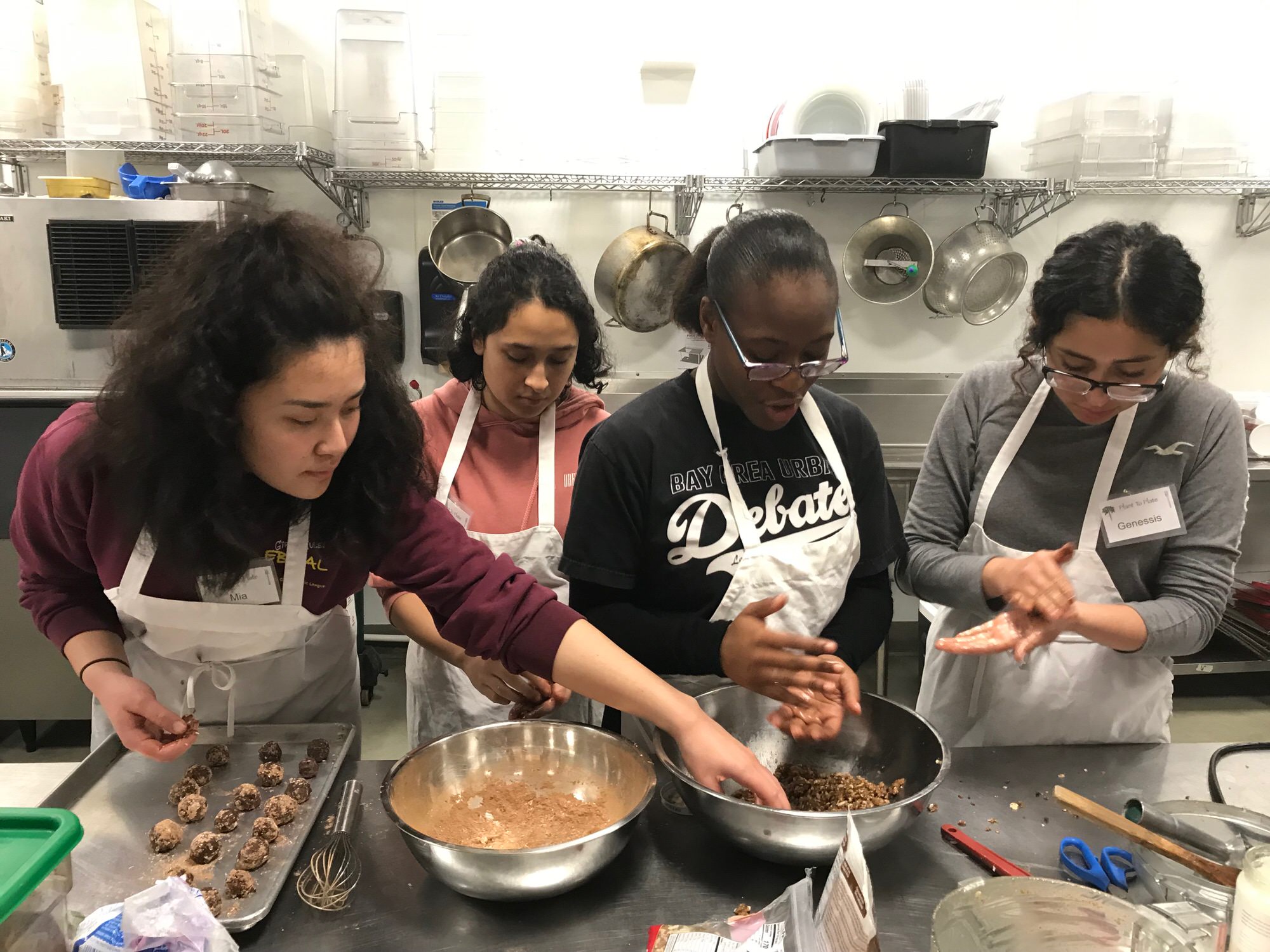 Plant to Plate interns in the kitchen